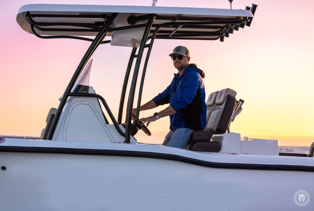 Man driving Florida 720 closeup of boat side view